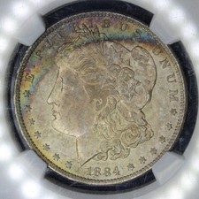 1884 O Morgan Silver Dollar NGC Graded MS64 Rainbow Color Toned Coin