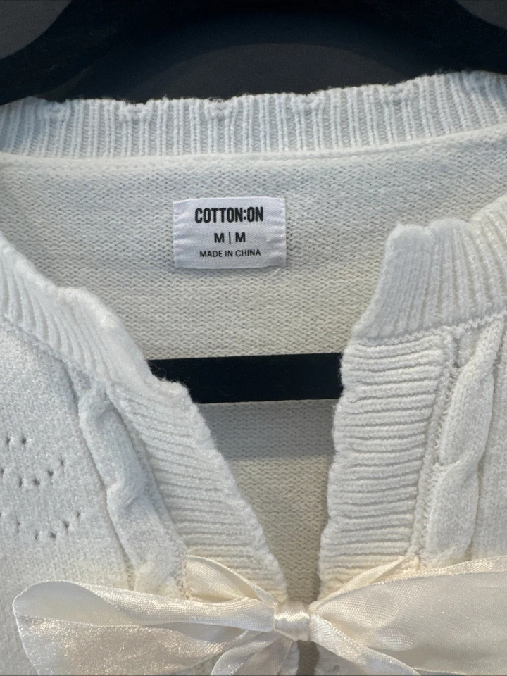 Suéter de algodón marfil con detalles de lazo. Talla M. Foto 3 de 4