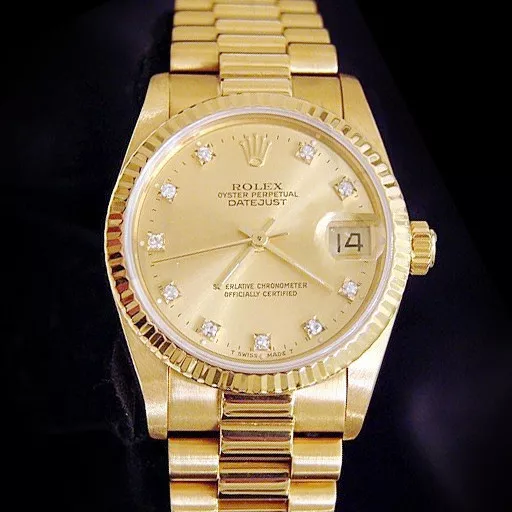How much gold is top in a rolex datejust
