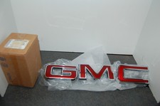 NEW GENUINE 2020 - 2026 GM 87815663 Grille Emblem GMC Sierra Yukon Red Chrome