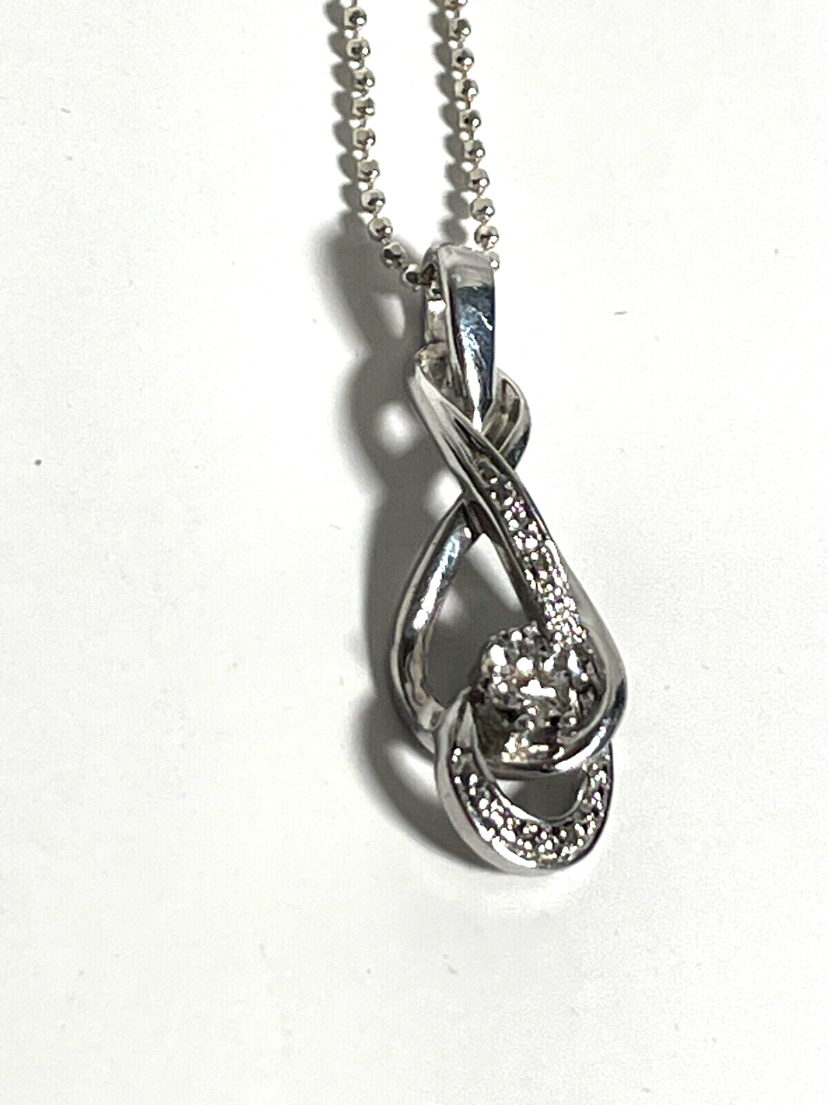 Interlocking Infinity Symbol with Diamond Chips S… - image 6