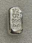 999 SILVER SKULL & CROSSBONES 1/2 TROY OUNCE  LOAF STYLE BAR ATLANTIS MINT