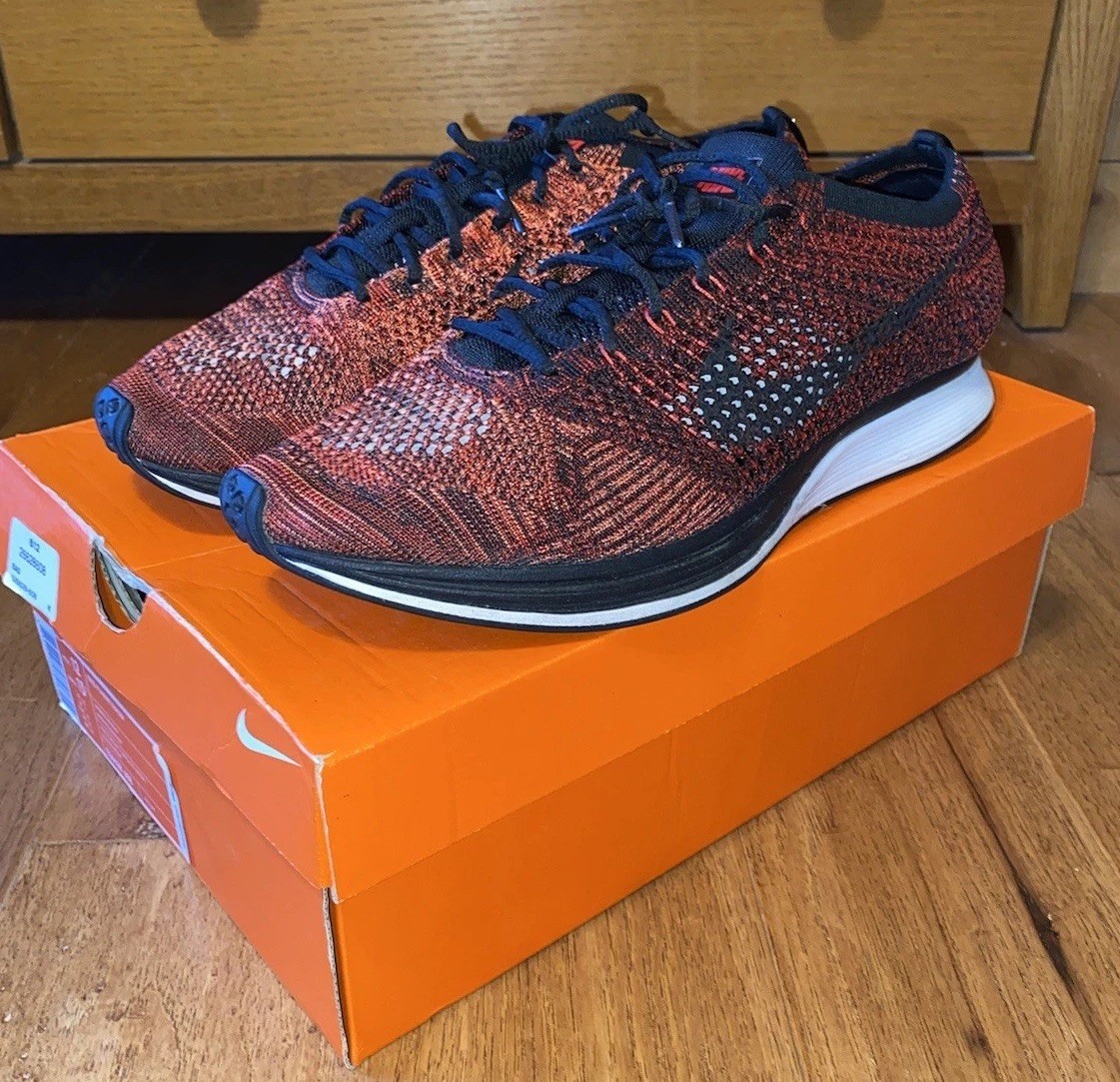 Nike Flyknit Racers Size 12 University Red/black. Open to negotiation.