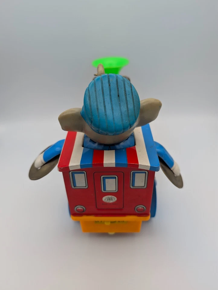 Juguetes modernos de colección litografía de hojalata y plástico elefante loco músico tren motor Foto 4 de 4