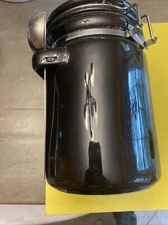 OGGi Black Canister 7 1/2 Tall With Stainless Spoon Clean And Sanitized