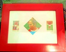 359 - Framed football stamps of Sir Bobby Charlton x 3
