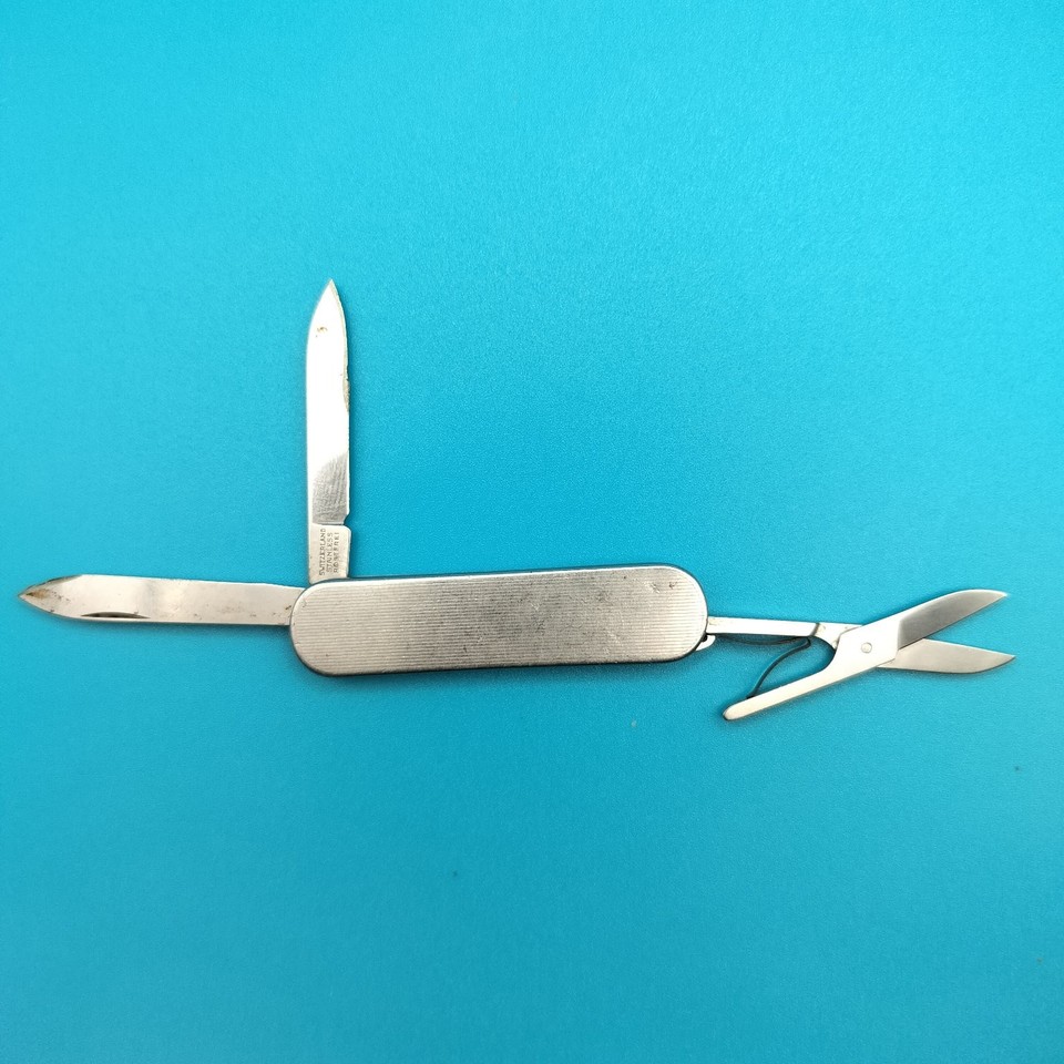 A Hoffritz Swiss multi-tool pocket knife — Hoffritz was once THE upscale cutlery brand in America, sold in department stores before Victorinox took over.