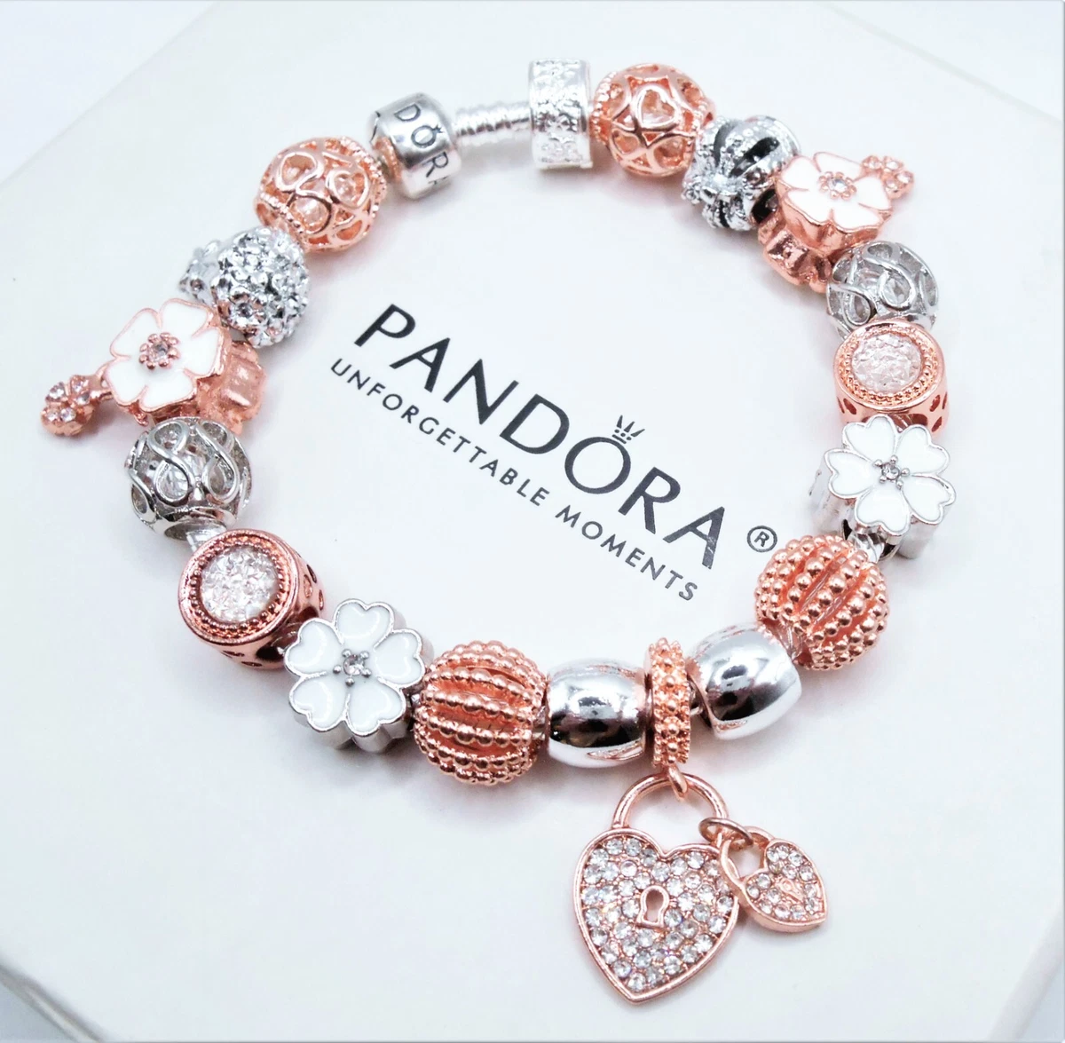 Pandora Bracelet With Pink and Rose Gold Character Themed Charms 