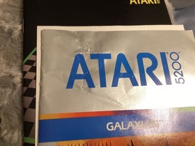 Mint condition cartridge of Galaxian Atari 5200 1981 complete with overlays