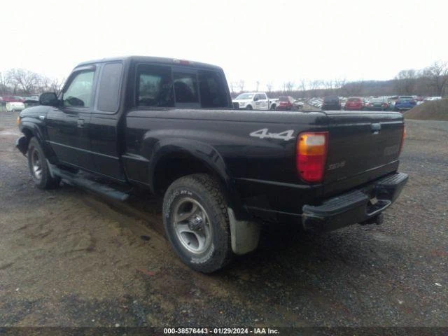 Espejo retrovisor manual izquierdo Mazda B-4000 2001 negro fabricante de equipos originales usado 463980 136 k millas Foto 3 de 4