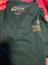 Three women's scrub sets and a jacket