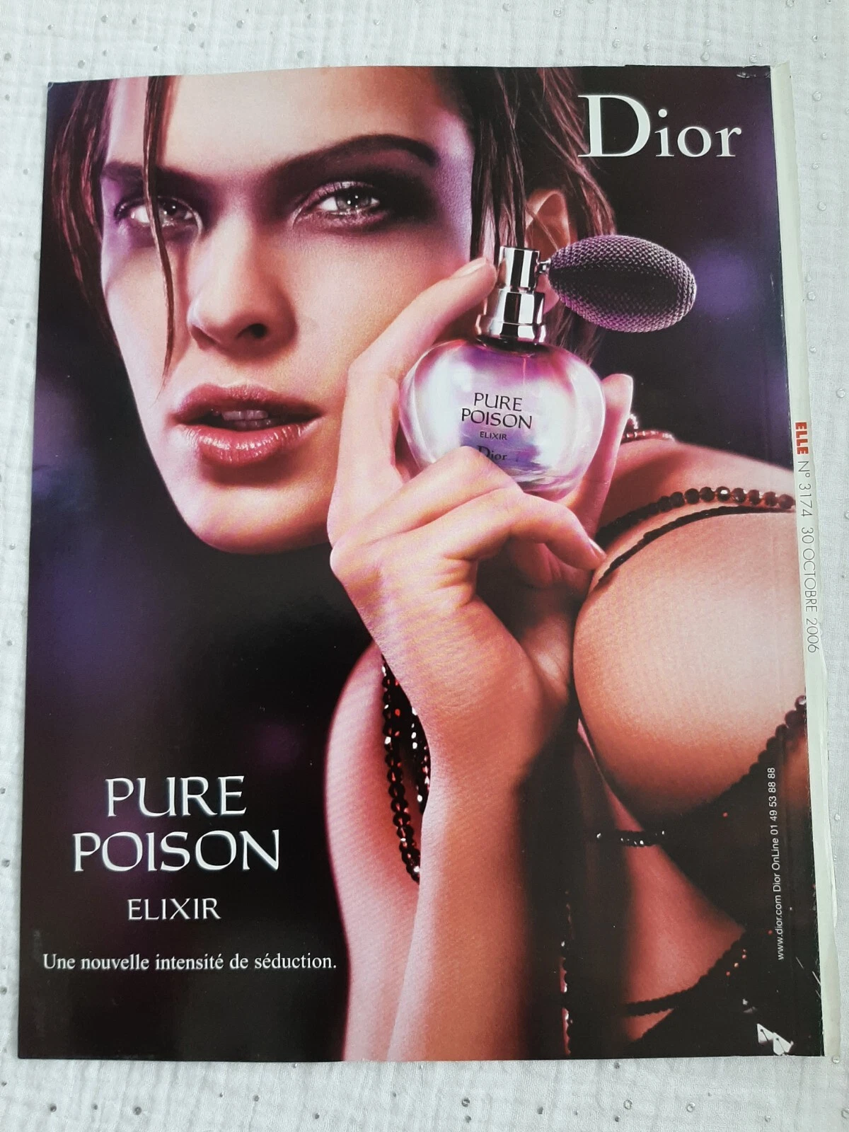 Publicité papier Parfum. Perfume Ad C. Dior Pure Poison Elixir de 2006