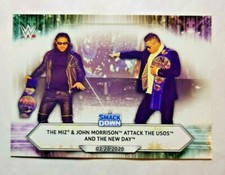 2021 Topps WWE #42 The Miz & John Morrison Attack The Usos wrestling card