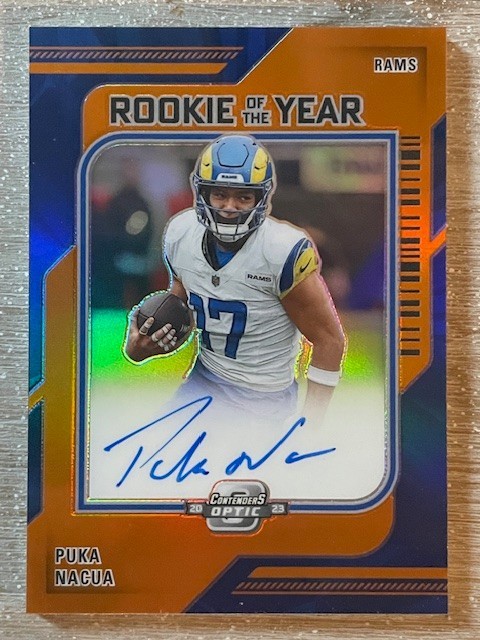 2023 Contenders Optic Puka Nacua Rookie of the Year RC On Card Auto Orange /50