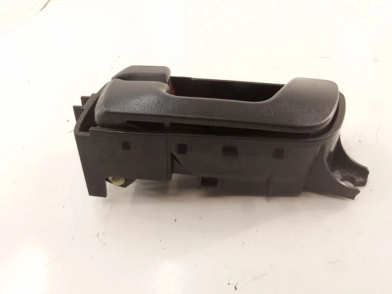 Barra de tracción de manija de puerta interior delantera izquierda conductor Mitsubishi Montero 2001 prueba OEM Foto 2 de 4