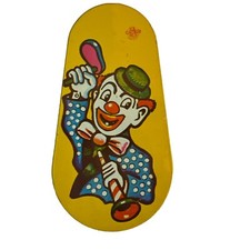 Tin Noise Maker U.S. Metal Toy Mfg. Co. Tin Clown Party Spinning Rattler Yellow
