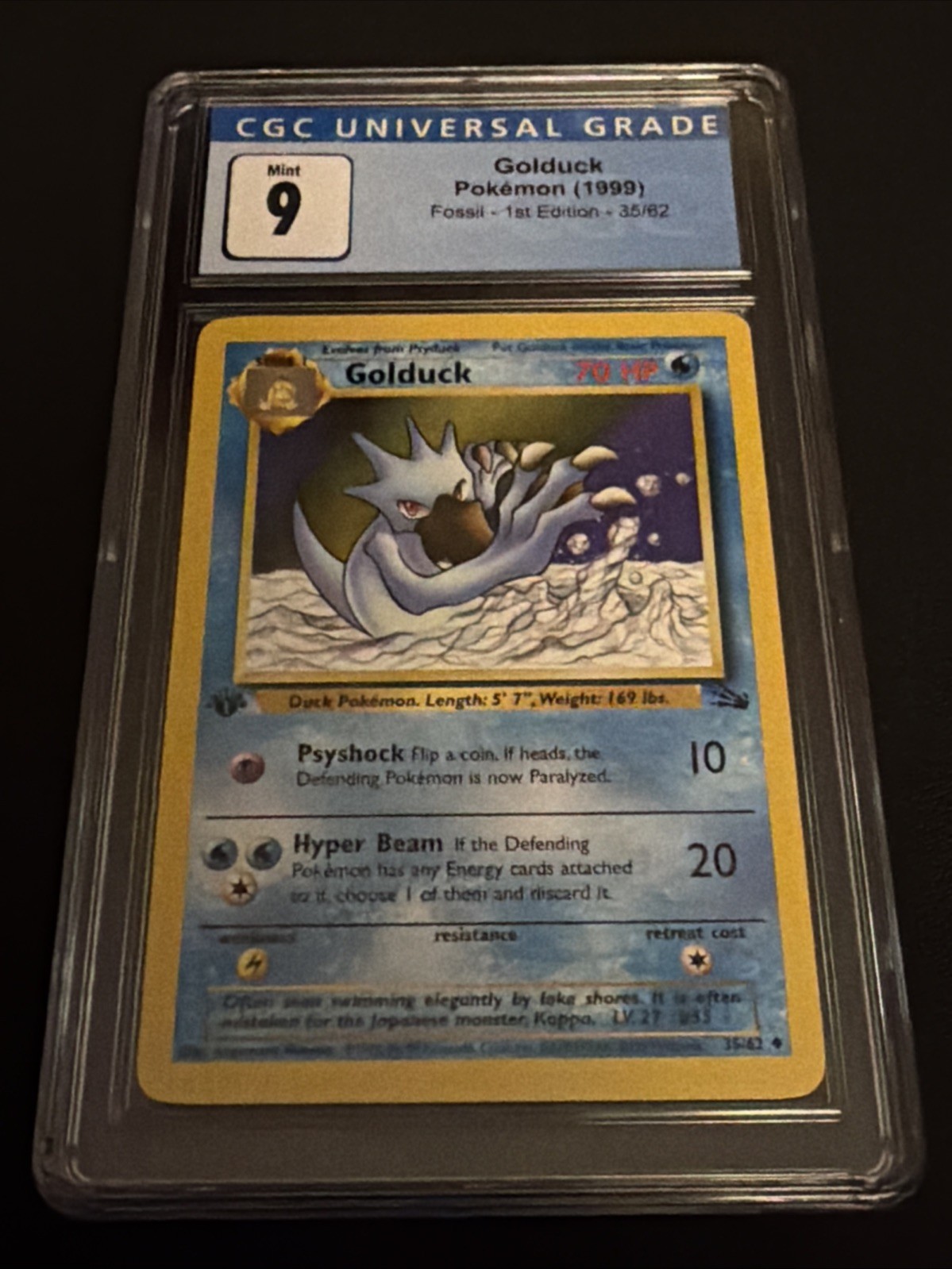 1999 POKEMON FOSSIL - FIRST ED #35/62 GOLDUCK CGC 9