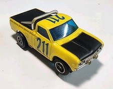 Vintage Aurora AFX Yellow 211 Datsun Pick Up Truck HO Slot Car