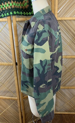 Vintage 1980s USA-made ranger shirt with green and brown camouflage pattern and two button-flap chest pockets.