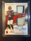 Shedeur Sanders RPA on card auto duel 2 color patches 34/99 Rookie 2025
