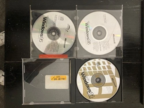 Microsoft Windows 95 CD + Upgrade disc & Windows 98 disc.