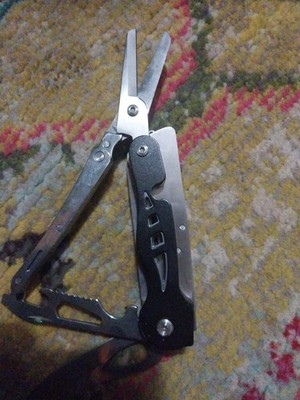 Multi Tool Knife Scissors  Saw Can Opener And Cork Screw