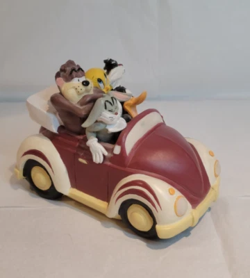 Warner Bros - Les Looney Tunes en voiture - Tirelire en résine - Photo 1/4