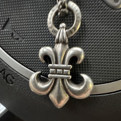 CH fleur de lis silver , Chuly dagger silver and a silver scull antique