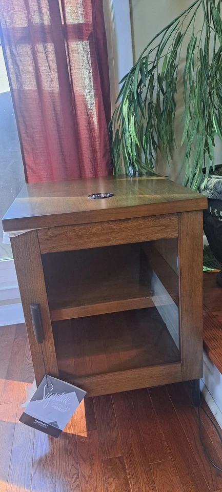 Mesa de centro elevadora marrón Signature Design by Ashley Torlanta Foto 3 de 4