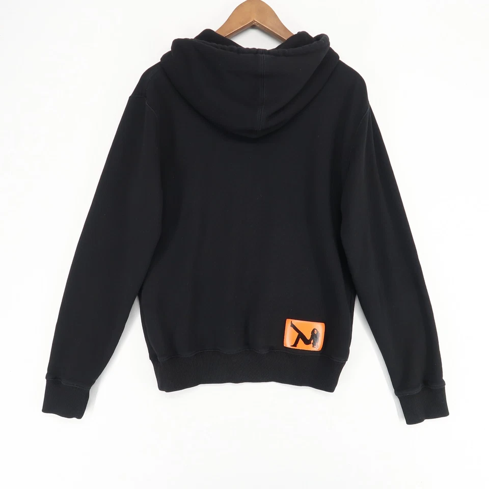 Sudadera con Capucha Calvin Klein X Raf Simons Adulto Pequeña Negra Brooke Shields Parche Naranja Foto 2 de 4
