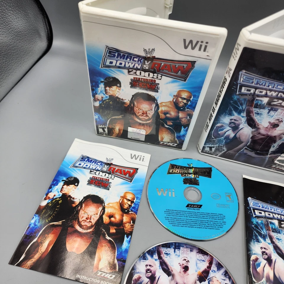 Lote de juegos de lucha libre Wii WWE SmackDown vs Raw 2008 + WWE 2011 (Nintendo) en caja original Foto 2 de 4