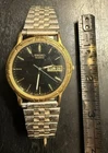 Vintage 90s Men’s Seiko 36m Day Date Quartz Dress Watch Black Dial Gold Tone W1E