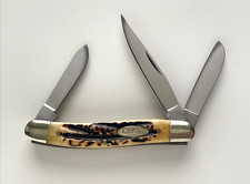 The CRKT 6063 Classic Stockman Burnt Amber Jig Bone