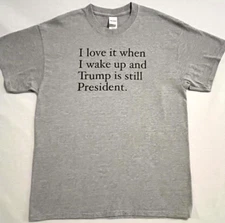 Trump Tee Shirt Gray ...TRUMP IS STILL PRESIDENT Size LG Uni-sex Short Sleeve