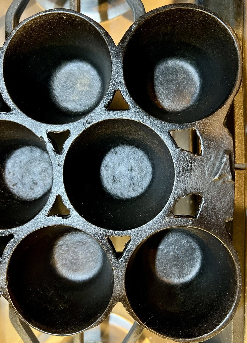 Antique 11-Hole Cast Iron Popover Pan, Two Inset Handles marked 10 A,  lbs