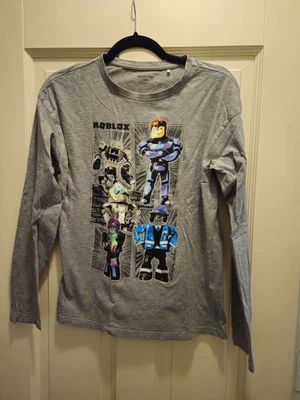 Drei Langarmshirts und Fünf T-Shirts Größe 158-182 - Bild 1 von 4