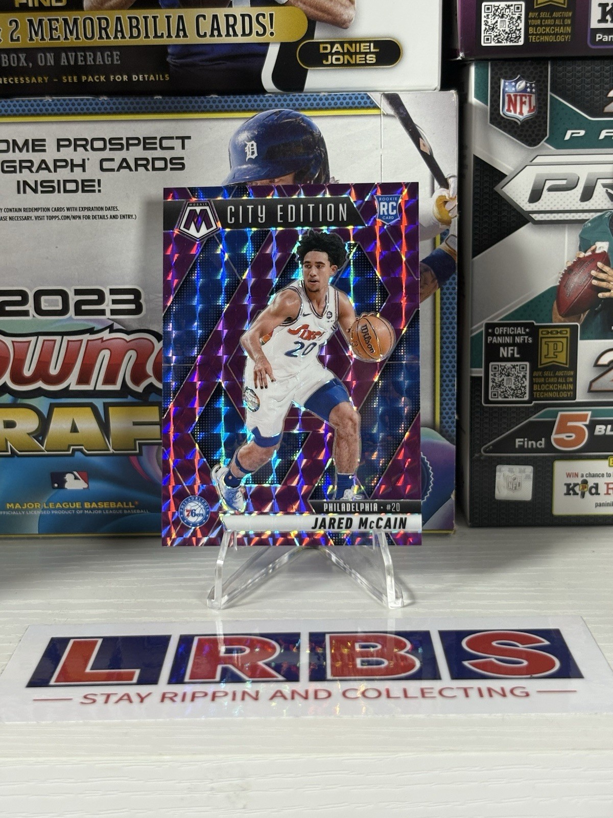 2024-25 Mosaic Jared McCain RC City Edition Purple /99 #227