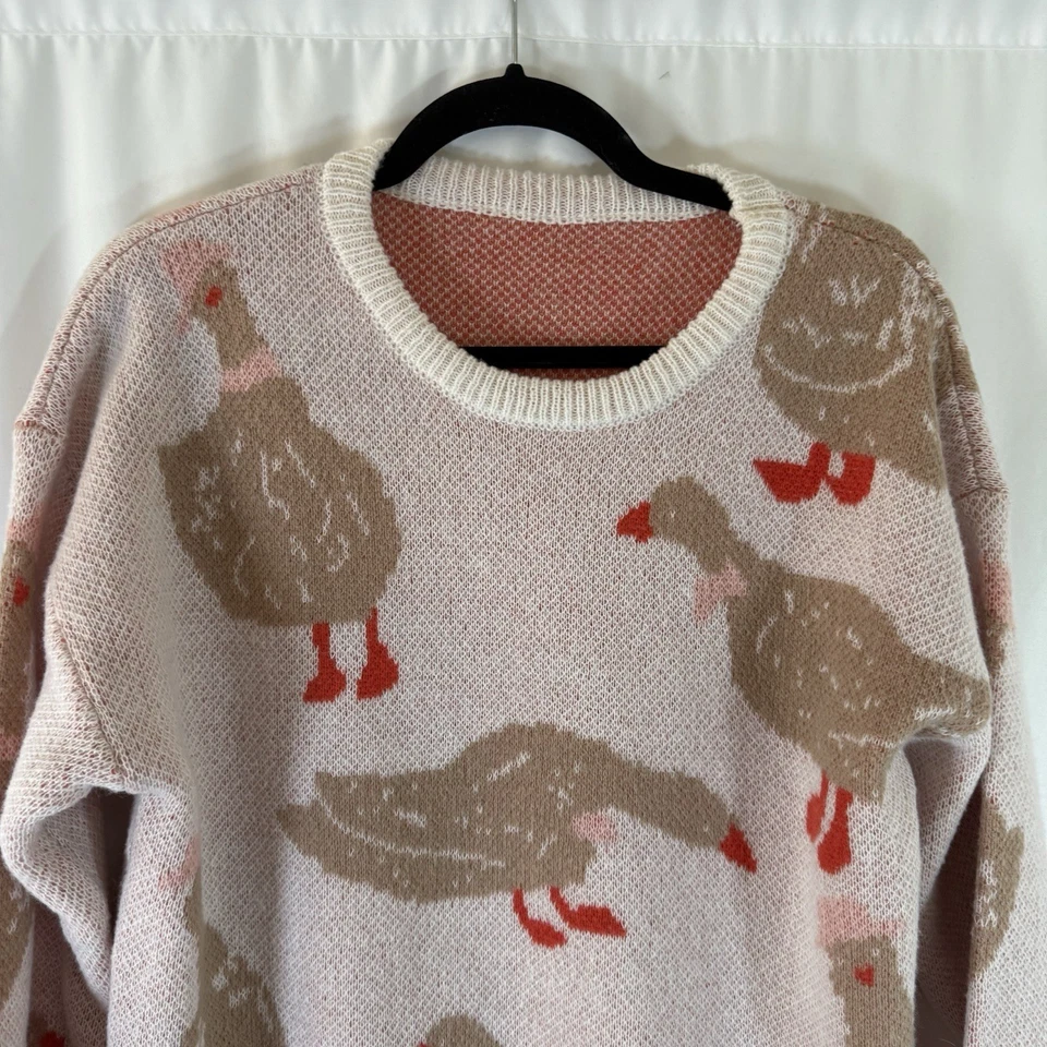 Suéter de ganso de invierno para mujer tejido rosa mediano manga larga cuello redondo Foto 2 de 4