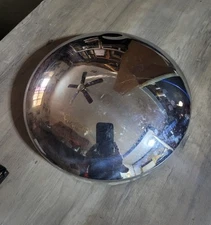 Vintage half Moon hubcap unknown year.   One