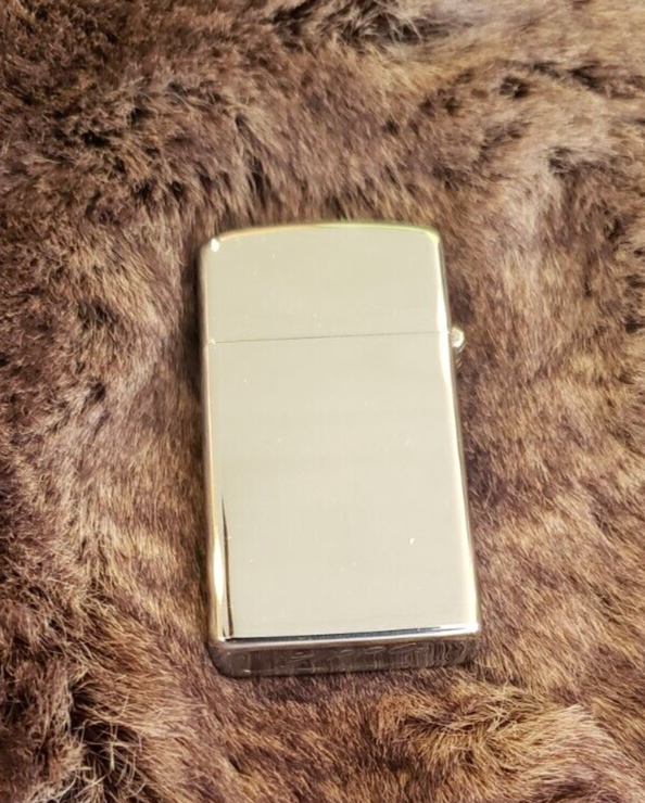 REDUCED!!! Vintage ZIPPO REDDY KILOWATT Lighter 1973