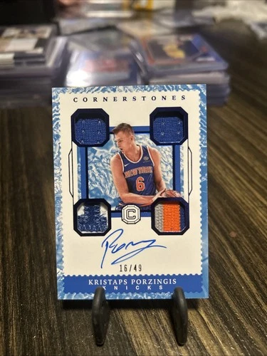 2017-18 Panini Cornerstones #C-KPZ Kristaps Porzingis #/49 Quad Jersey Auto