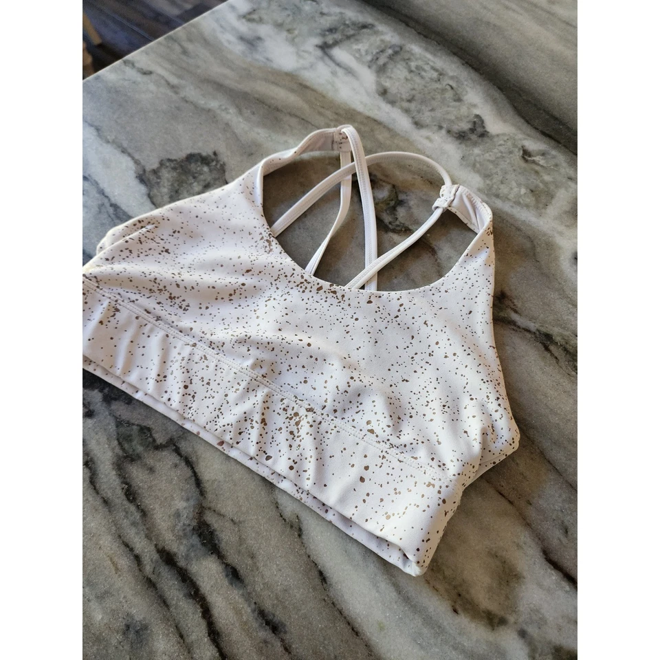 Sujetador deportivo ZYIA blanco Stay dorado claro y apretado con tiras mediano - sin almohadillas Foto 3 de 4