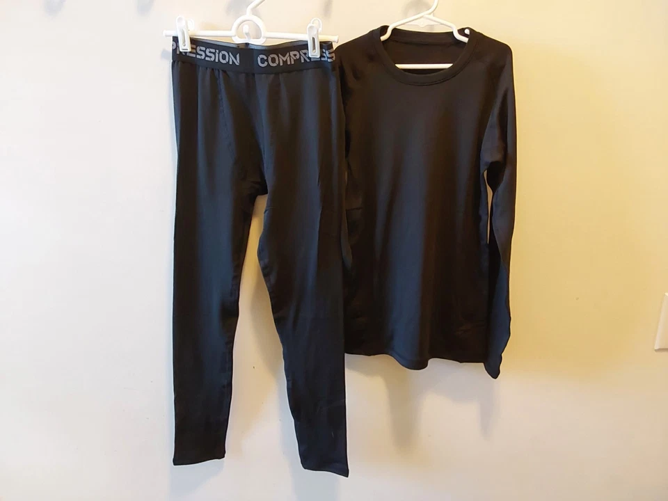 2 juegos térmicos de compresión E Pro negros y grises para niño / talla L / nuevos sin etiquetas Foto 2 de 4