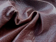 Goatskin leather hide Chocolate grainy textured full bodied very strong