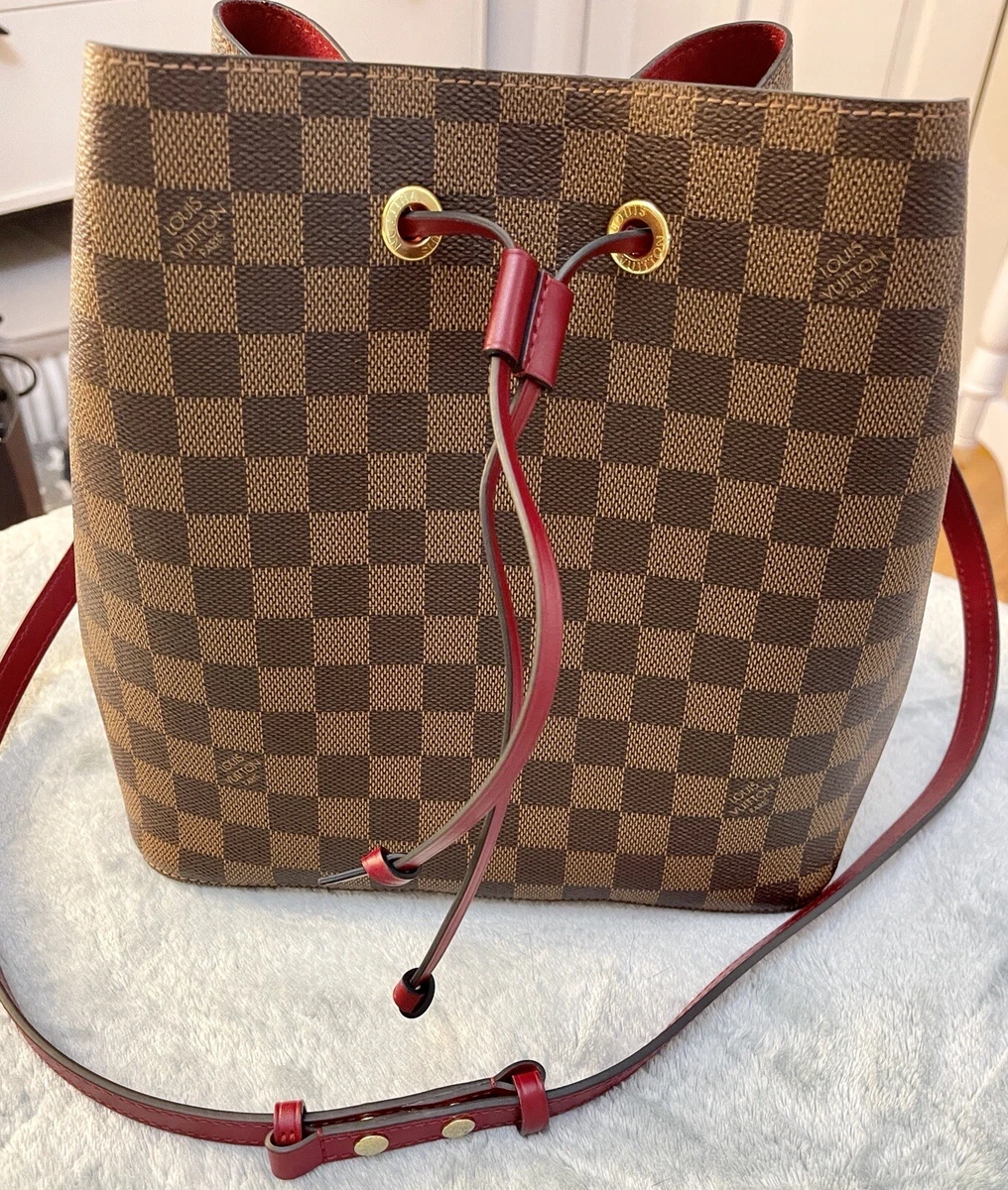 Louis Vuitton womens Damiere NoeNoe bucket bag with red Straps.