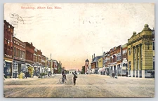 Postcard Albert Lea Minnesota Broadway Street Cigar Store Bicycle Posted 1909