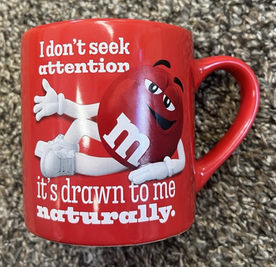 M&M's  ''I Don't Seek Attention It's Drawn to Me Naturally'' Red Mug 