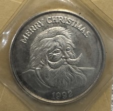 1992 1 Troy Oz .999 Silver Round “Merry Xmas”, in its Original Sealed Pouch!! 79.95 per troy oz