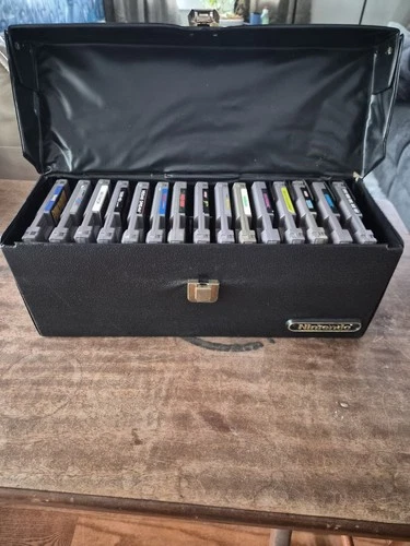 Vtg. Lot of 15 Nintendo Game Cartridges in a Black Nintendo (Logo) Storage Case
