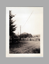 WW2 Era Photo U.S. GIs In Line Walking On Building Grounds